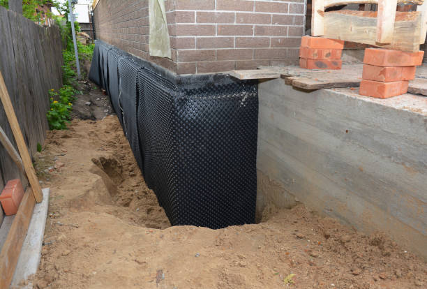 SJ Waterproofing Pros technician performing targeted Waterproofing assessment in West Milton, PA